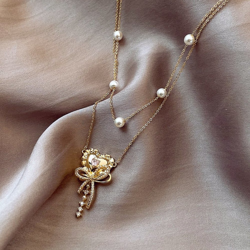 GOLICC Pearl Bow Necklace - Picture 5 of 8